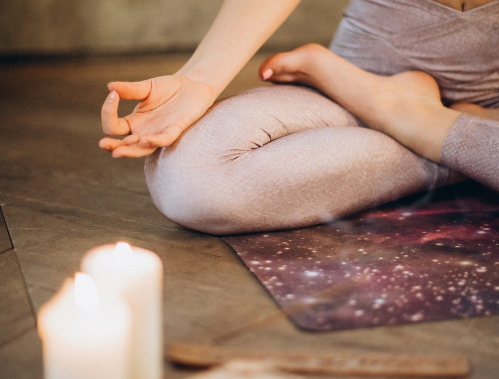 Meditation with candles for conscious living